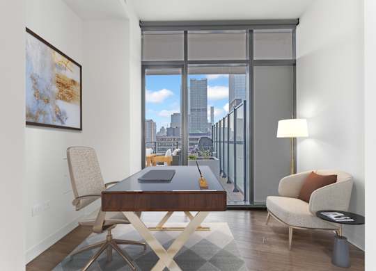 a home office with a desk and a view of the city at Cassidy on Canal, Chicago, IL, 60606
