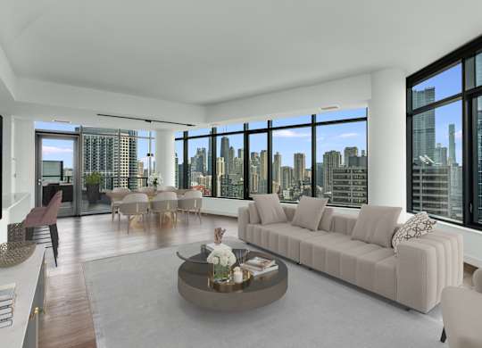 a living room with a white couch and a table and a view of the city at Cassidy on Canal, Chicago, Illinois, 60606