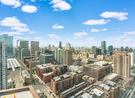 a view of the city from the top of a skyscraper