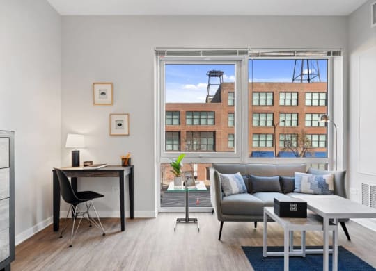 Living Area With Study Table at 23rd Place Apartment, Chicago, IL, 60654