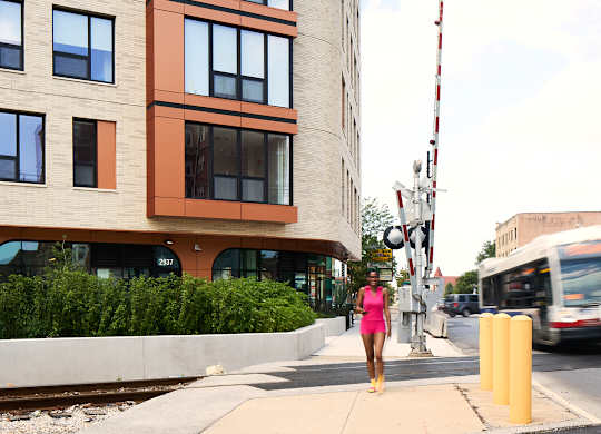 Modern mixed use building with street level retail at Thrive Exchange Apartments, Chicago