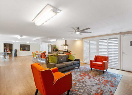 a conference room with chairs and a table and windows at Terramonte Apartment Homes, California, 91767