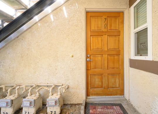the front door of the house at Oak Terrace Senior Apts, Hemet, 92543