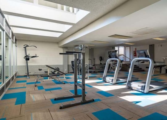 a gym with a lot of exercise equipment at Mountainview Venture, Covina California