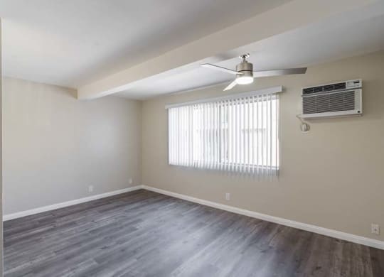 an empty room with a ceiling fan and a window at Mountainview Venture, California, 91722