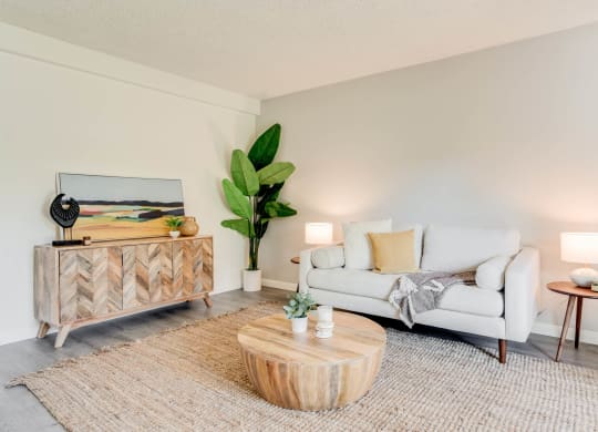 a living room with a couch and a coffee table at University Park, Azusa California