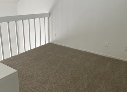 an empty bedroom with white walls and carpet at Fiesta Apts, Lompoc, 93436