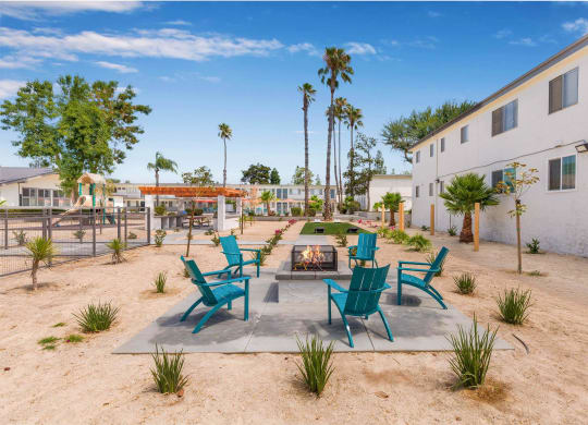 an outside patio with chairs and a fire pit at Sunnymead Apts Apartments, Moreno Valley, 92553