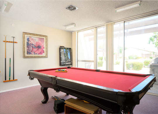a games room with a pool table and a television at Villa Hemet, Hemet, 92543