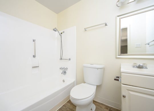a bathroom with a bathtub and a toilet at Villa Hemet, Hemet, CA 92543