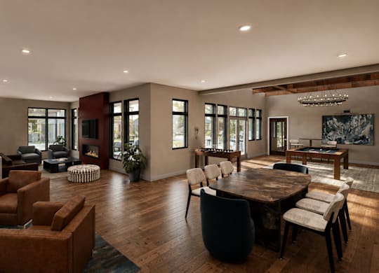 A modern living room with a large wooden table and chairs.
