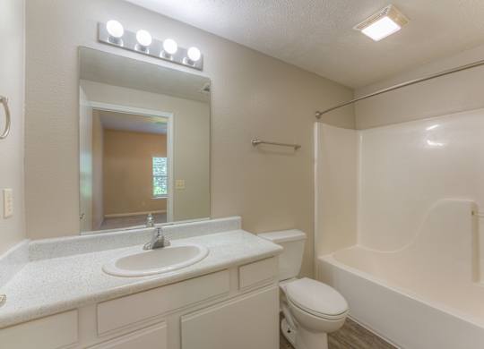 One and two bedroom apartment homes featuring efficient appliances, hardwood floors, walk-in closets, washer and dryer connections and much more at Parham Pointe Apartments in Little Rock, AR