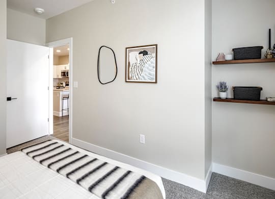 Brand new modern studio, one and two-bedroom apartment homes featuring stainless steel appliances, tile backsplash, quartz countertops, LVP flooring, large picture windows, in-unit washer and dryer and balconies at The Artisan at 39th in Omaha, NE