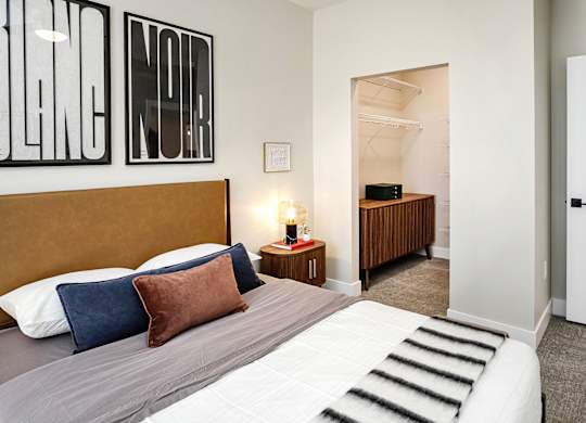 Brand new modern studio, one and two-bedroom apartment homes featuring stainless steel appliances, tile backsplash, quartz countertops, LVP flooring, large picture windows, in-unit washer and dryer and balconies at The Artisan at 39th in Omaha, NE