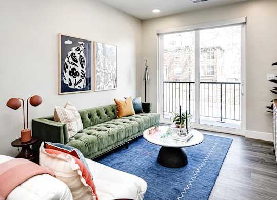 Brand new modern studio, one and two-bedroom apartment homes featuring stainless steel appliances, tile backsplash, quartz countertops, LVP flooring, large picture windows, in-unit washer and dryer and balconies at The Artisan at 39th in Omaha, NE