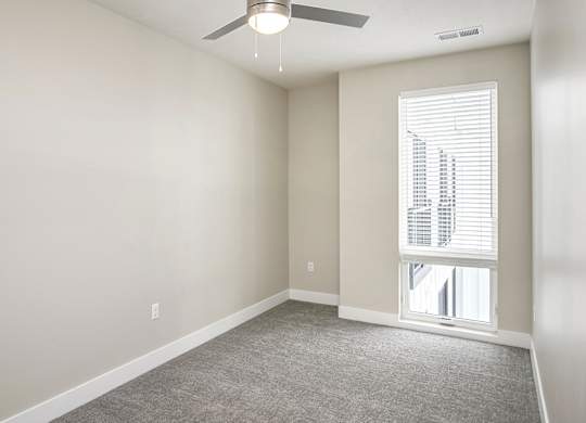 Brand new modern studio, one and two-bedroom apartment homes featuring stainless steel appliances, tile backsplash, quartz countertops, LVP flooring, large picture windows, in-unit washer and dryer and balconies at The Artisan at 39th in Omaha, NE