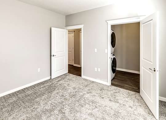 Bedroom at Deerfield Apartments and Chateaus in Fremont, NE