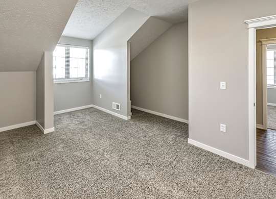 Bedroom at Deerfield Apartments and Chateaus in Fremont, NE