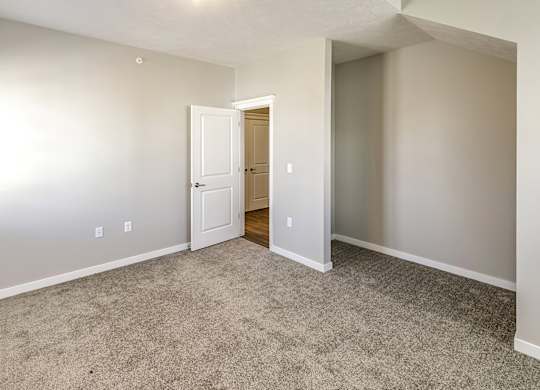 Bedroom at Deerfield Apartments and Chateaus in Fremont, NE
