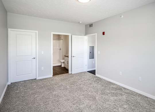 Bedroom at Deerfield Apartments and Chateaus in Fremont, NE