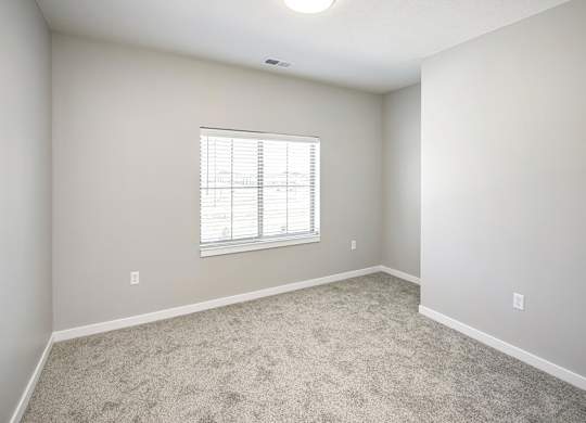 Bedroom at Deerfield Apartments and Chateaus in Fremont, NE