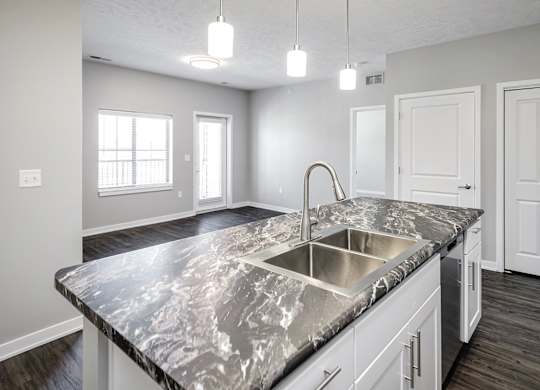 Kitchen island at Deerfield Apartments and Chateaus in Fremont, NE