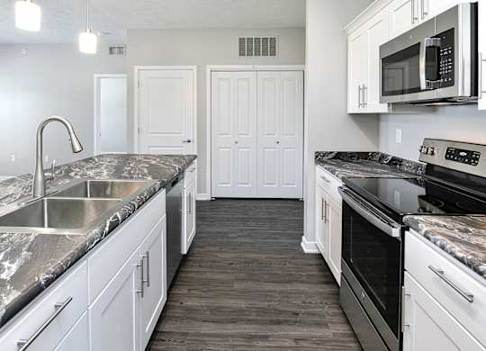Kitchen at Deerfield Apartments and Chateaus in Fremont, NE