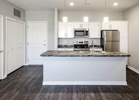 Stainless steel appliances at Deerfield Apartments and Chateaus in Fremont, NE