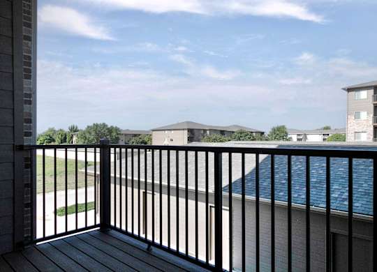 Balcony at Deerfield Apartments and Chateaus in Fremont, NE