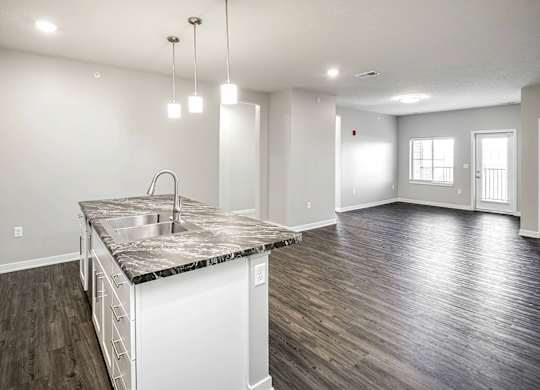 Spacious Living Room at Deerfield Apartments and Chateaus in Fremont, NE