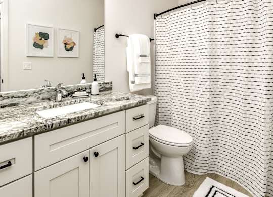 Modern bathroom model at Edge 204 in Omaha, NE