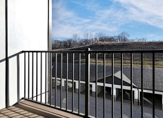Modern one- and two-bedroom apartments featuring stainless steel appliances, high-end lighting, premium LVT flooring, granite countertops and more at The Ridgeline in Council Bluffs, IA