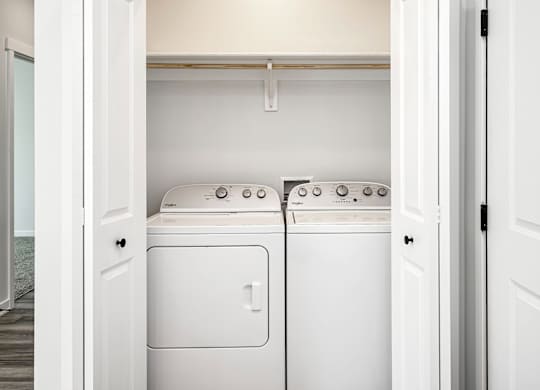 Modern one- and two-bedroom apartments featuring stainless steel appliances, high-end lighting, premium LVT flooring, granite countertops and more at The Ridgeline in Council Bluffs, IA