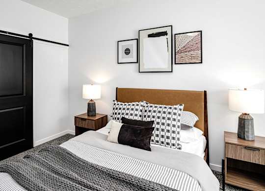 Modern one- and two-bedroom apartments featuring stainless steel appliances, high-end lighting, premium LVT flooring, granite countertops and more at The Ridgeline in Council Bluffs, IA
