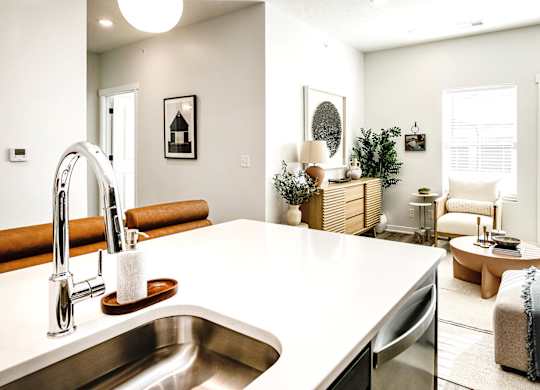 Modern one- and two-bedroom apartments featuring stainless steel appliances, high-end lighting, premium LVT flooring, granite countertops and more at The Ridgeline in Council Bluffs, IA