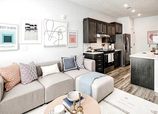 Modern one- and two-bedroom apartments featuring stainless steel appliances, high-end lighting, premium LVT flooring, granite countertops and more at The Ridgeline in Council Bluffs, IA