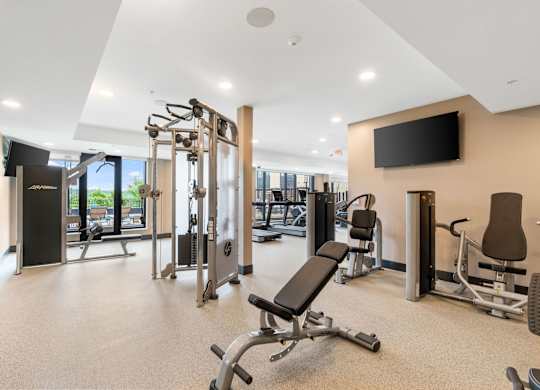 The resort-style luxury 24-hour fitness center at Lilia in Lilydale, MN 55118, with cardio equipment, free weights, and exercise machines.
