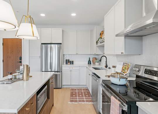Kitchen in a one-bedroom, one-bathroom apartment home at Lilia in Lilydale, MN 55118