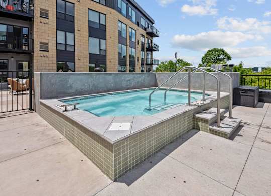 Outdoor Pool and Spa at Lilia Apartments in Lilydale, MN 55118