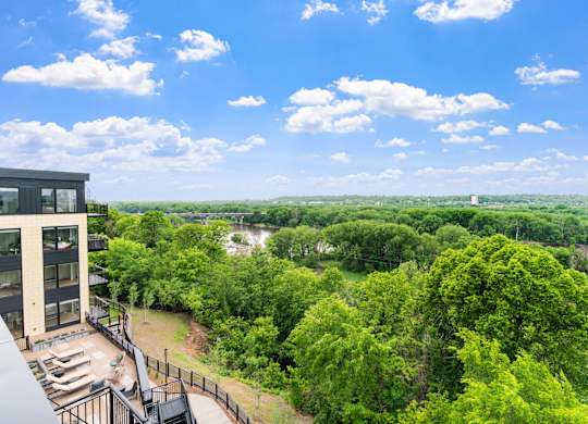 The view of the Mississippi River from the top floor terrace with seating and fire pits leading from the Parlour and the Tea Room at Lilia in Lilydale, 55118