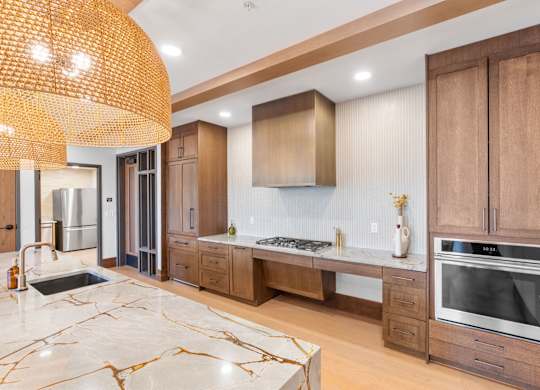The oversized kitchen in the Private Dining Room, a reservable community room at Lilia in Lilydale, MN 55118