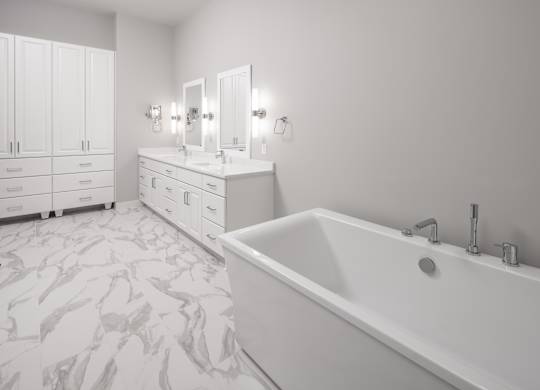 a large white bathroom with a tub and two sinks at Expo, Minneapolis, MN