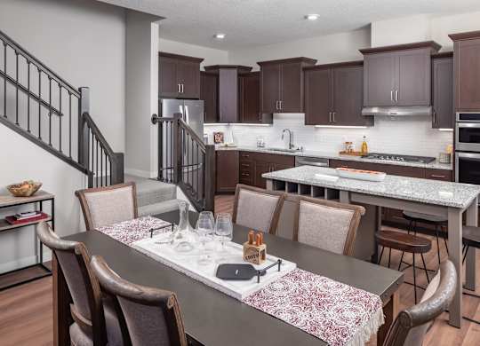 a kitchen and dining area with a table and chairs at Expo, Minneapolis Minnesota