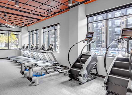 a gym with cardio equipment and exercise machines at Expo, Minnesota, 55414