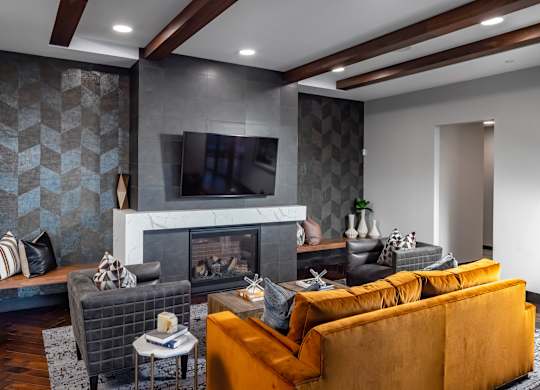 a living room with a fireplace and a tv above it at Expo, Minneapolis, 55414