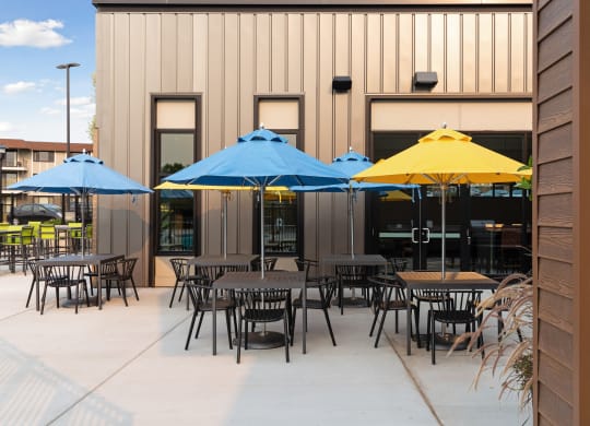 Covered tables outside at Villages on McKnight, St. Paul, MN