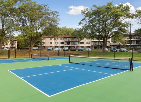 Play tennis  at Villages on McKnight, St. Paul, Minnesota