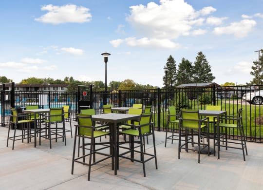 Hightop tables outside  at Villages on McKnight, St. Paul, MN, 55119