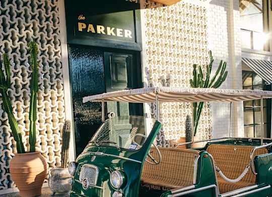 A green and white vintage car at The PARKER on E Mulberry Apartments, San Antonio, TX, 78209