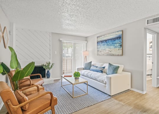 a living room with a couch and a table at District 2308, Texas ?